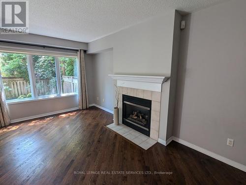 47B - 1084 Queen Street W, Mississauga (Lorne Park), ON - Indoor Photo Showing Living Room With Fireplace