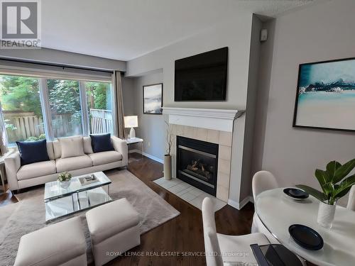 47B - 1084 Queen Street W, Mississauga (Lorne Park), ON - Indoor Photo Showing Living Room With Fireplace