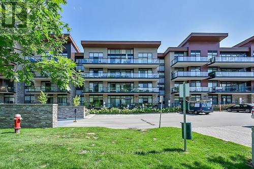 304 - 1575 Lakeshore Road W, Mississauga (Clarkson), ON - Outdoor With Balcony With Facade