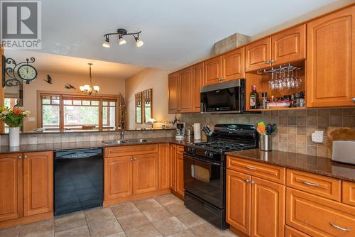 1003 Mountain View Road Unit# B, Rossland, BC - Indoor Photo Showing Kitchen With Double Sink