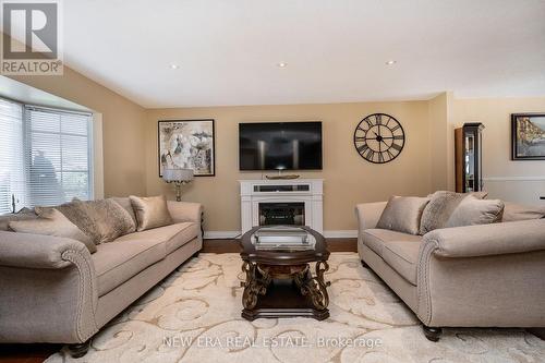 674 Laurier Avenue, Milton, ON - Indoor Photo Showing Living Room With Fireplace