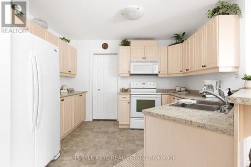 206 - 24 Dairy Lane, Huntsville, ON - Indoor Photo Showing Kitchen With Double Sink