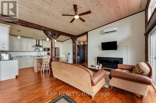 1083 Riverside Drive, Parry Sound Remote Area, ON - Indoor Photo Showing Living Room With Fireplace