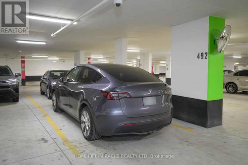 4208 - 7890 Jane Street, Vaughan, ON - Indoor Photo Showing Garage