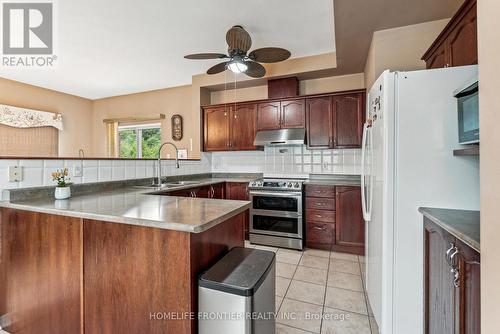 1906 Webster Boulevard W, Innisfil, ON - Indoor Photo Showing Kitchen With Double Sink