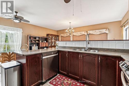 1906 Webster Boulevard W, Innisfil, ON - Indoor Photo Showing Kitchen With Double Sink