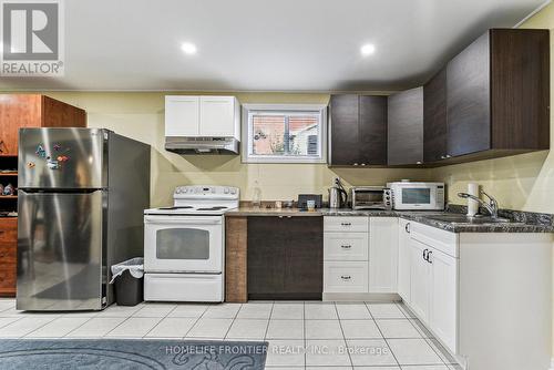 1906 Webster Boulevard W, Innisfil, ON - Indoor Photo Showing Kitchen With Double Sink