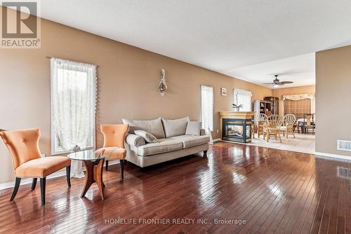 1906 Webster Boulevard W, Innisfil, ON - Indoor Photo Showing Living Room With Fireplace