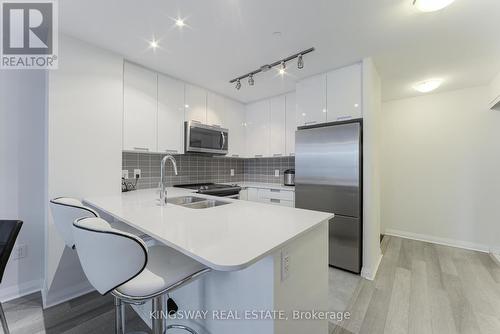 119 - 5033 Four Springs Avenue, Mississauga, ON - Indoor Photo Showing Kitchen With Double Sink With Upgraded Kitchen