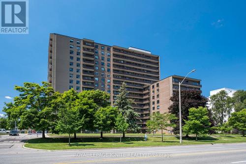 201 - 180 Markham Road, Toronto (Scarborough Village), ON - Outdoor With Balcony With Facade