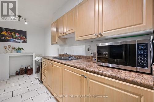 201 - 180 Markham Road, Toronto (Scarborough Village), ON - Indoor Photo Showing Kitchen With Double Sink