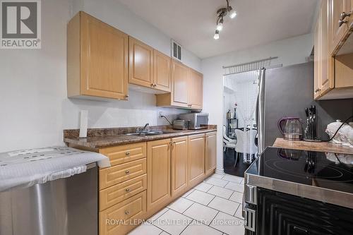 201 - 180 Markham Road, Toronto (Scarborough Village), ON - Indoor Photo Showing Kitchen With Double Sink