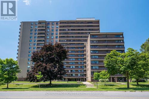 201 - 180 Markham Road, Toronto (Scarborough Village), ON - Outdoor With Balcony With Facade