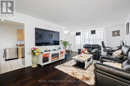 201 - 180 Markham Road, Toronto (Scarborough Village), ON - Indoor Photo Showing Living Room