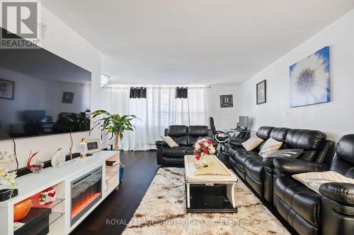 201 - 180 Markham Road, Toronto (Scarborough Village), ON - Indoor Photo Showing Living Room