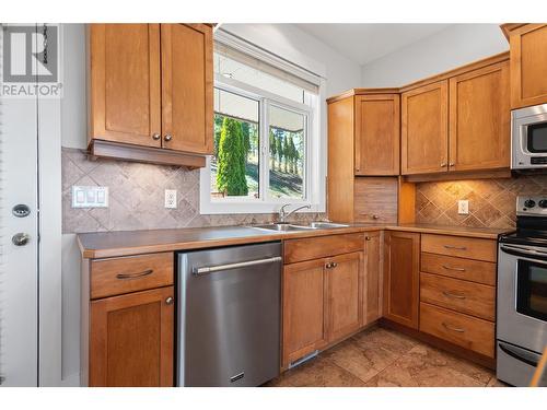 4983 Windsong Crescent, Kelowna, BC - Indoor Photo Showing Kitchen With Double Sink