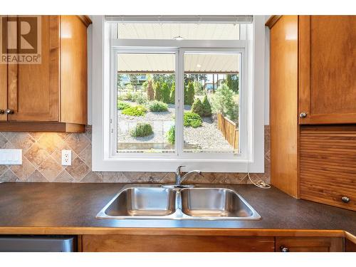 4983 Windsong Crescent, Kelowna, BC - Indoor Photo Showing Kitchen With Double Sink