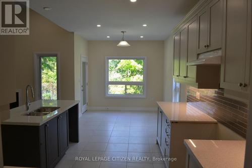 32 Revol Road, Penetanguishene, ON - Indoor Photo Showing Kitchen With Double Sink