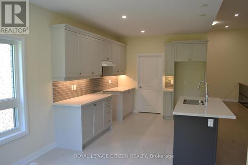 32 Revol Road, Penetanguishene, ON - Indoor Photo Showing Kitchen With Double Sink