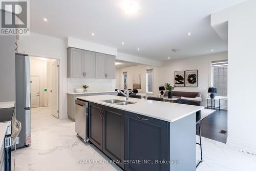 58 Workgreen Park Way, Brampton (Bram West), ON - Indoor Photo Showing Kitchen With Double Sink