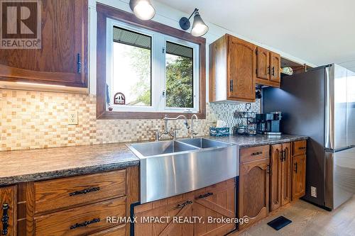 32 Totten Drive, Kawartha Lakes (Fenelon Falls), ON - Indoor Photo Showing Kitchen With Double Sink