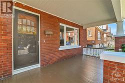 All Brick Craftsman features HUGE Porch & Original Woodwork throughout! - 