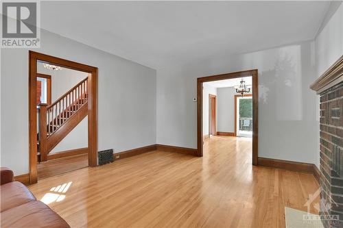 Formal Living Room with Wood Fireplace! - 62 Lees Avenue, Ottawa, ON - Indoor With Fireplace