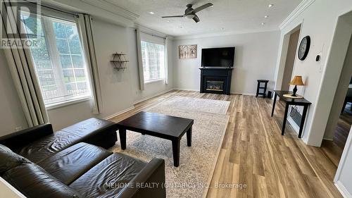 298 Alexander Crescent, Milton (Dempsey), ON - Indoor Photo Showing Living Room With Fireplace