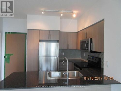 506 - 55 Speers Road, Oakville, ON - Indoor Photo Showing Kitchen With Double Sink