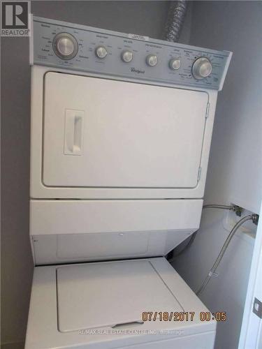 506 - 55 Speers Road, Oakville, ON - Indoor Photo Showing Laundry Room