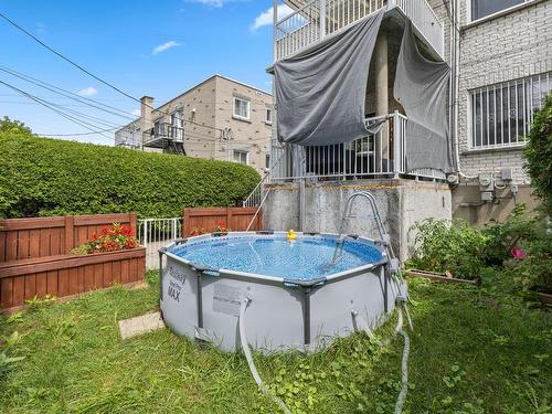 Backyard - 475  - 477 Rue Deguire, Montréal (Saint-Laurent), QC - Outdoor With Above Ground Pool