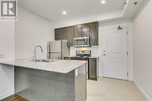 608 - 2490 Old Bronte Road, Oakville (Palermo West), ON - Indoor Photo Showing Kitchen With Double Sink With Upgraded Kitchen