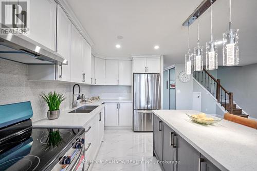 212 - 3025 The Credit Woodlands, Mississauga (Erindale), ON - Indoor Photo Showing Kitchen With Stainless Steel Kitchen With Double Sink With Upgraded Kitchen