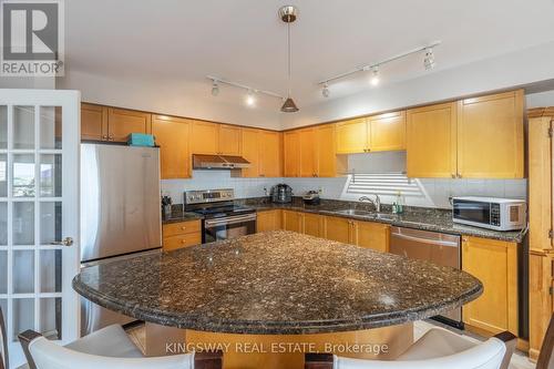 2018 - 25 Kingsbridge Garden Circle, Mississauga (Hurontario), ON - Indoor Photo Showing Kitchen With Double Sink