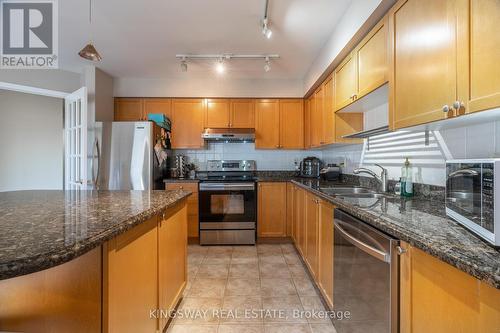 2018 - 25 Kingsbridge Garden Circle, Mississauga (Hurontario), ON - Indoor Photo Showing Kitchen With Double Sink