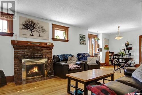 2358 Atkinson Street, Regina, SK - Indoor Photo Showing Living Room With Fireplace