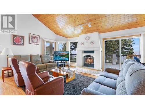 1089 Scenic  Place, Windermere, BC - Indoor Photo Showing Living Room With Fireplace