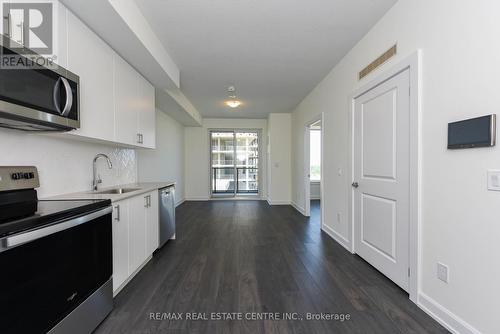 1112 - 3220 William Coltson Avenue, Oakville, ON - Indoor Photo Showing Kitchen