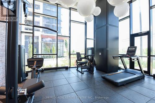 1112 - 3220 William Coltson Avenue, Oakville, ON - Indoor Photo Showing Gym Room