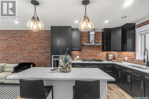 1005 Osler Street, Saskatoon, SK - Indoor Photo Showing Kitchen With Double Sink With Upgraded Kitchen