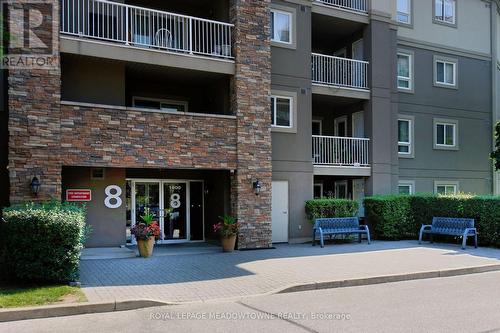 1416 - 8 Dayspring Circle, Brampton (Goreway Drive Corridor), ON - Outdoor With Balcony With Facade