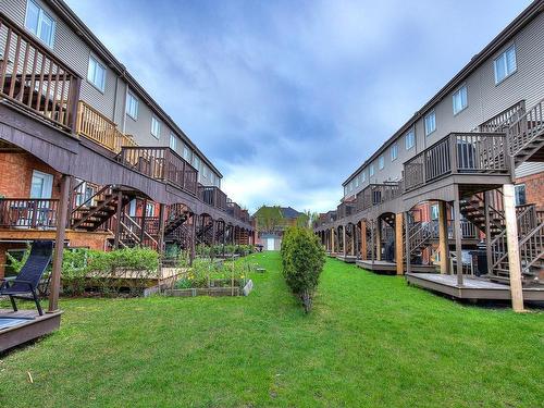 Garden - 596 Rue Étienne-Lavoie, Laval (Sainte-Dorothée), QC - Outdoor With Balcony With Exterior