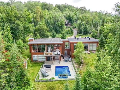 Back facade - 52  - 52A Rue Du Lac-Walfred N., Sainte-Marguerite-Du-Lac-Masson, QC - Outdoor