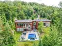 Back facade - 52  - 52A Rue Du Lac-Walfred N., Sainte-Marguerite-Du-Lac-Masson, QC  - Outdoor 