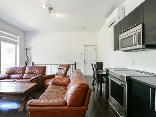 Vue d'ensemble - 52  - 52A Rue Du Lac-Walfred N., Sainte-Marguerite-Du-Lac-Masson, QC - Indoor Photo Showing Living Room