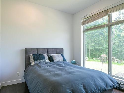 Chambre Ã Â coucher - 52  - 52A Rue Du Lac-Walfred N., Sainte-Marguerite-Du-Lac-Masson, QC - Indoor Photo Showing Bedroom