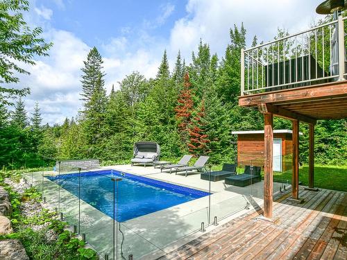 Pool - 52  - 52A Rue Du Lac-Walfred N., Sainte-Marguerite-Du-Lac-Masson, QC - Outdoor With In Ground Pool With Deck Patio Veranda With Backyard