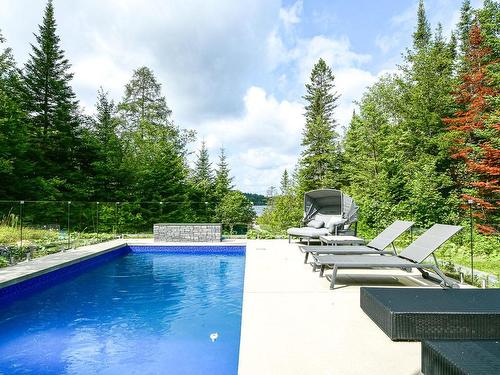 Piscine - 52  - 52A Rue Du Lac-Walfred N., Sainte-Marguerite-Du-Lac-Masson, QC - Outdoor With In Ground Pool With Backyard