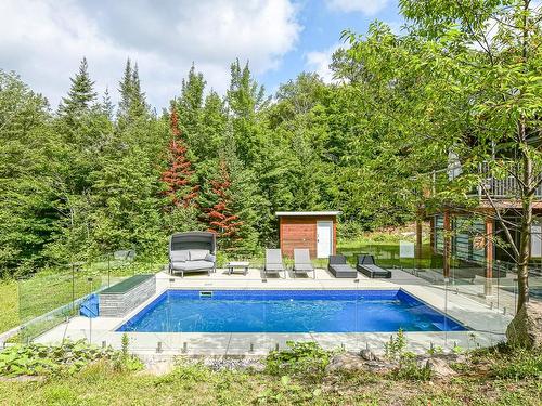 Piscine - 52  - 52A Rue Du Lac-Walfred N., Sainte-Marguerite-Du-Lac-Masson, QC - Outdoor With In Ground Pool With Backyard