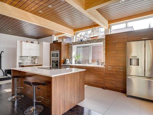 Cuisine - 52  - 52A Rue Du Lac-Walfred N., Sainte-Marguerite-Du-Lac-Masson, QC - Indoor Photo Showing Kitchen